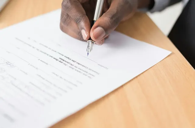 Estate planning documents and notes on a table